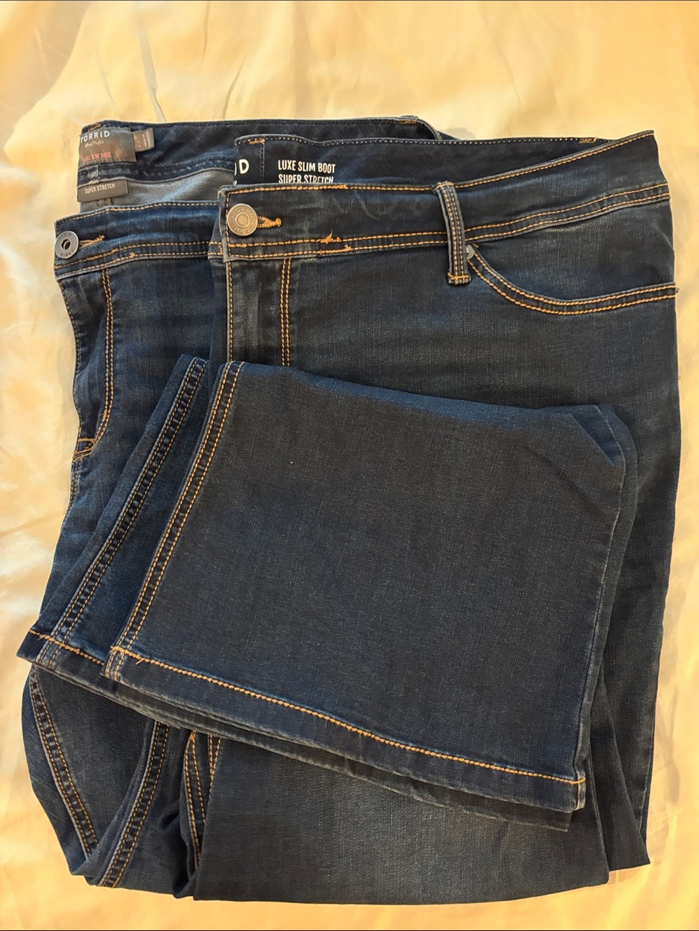 Two Pair of torrid Dark Blue Slim Bootcut Luxe Jeans